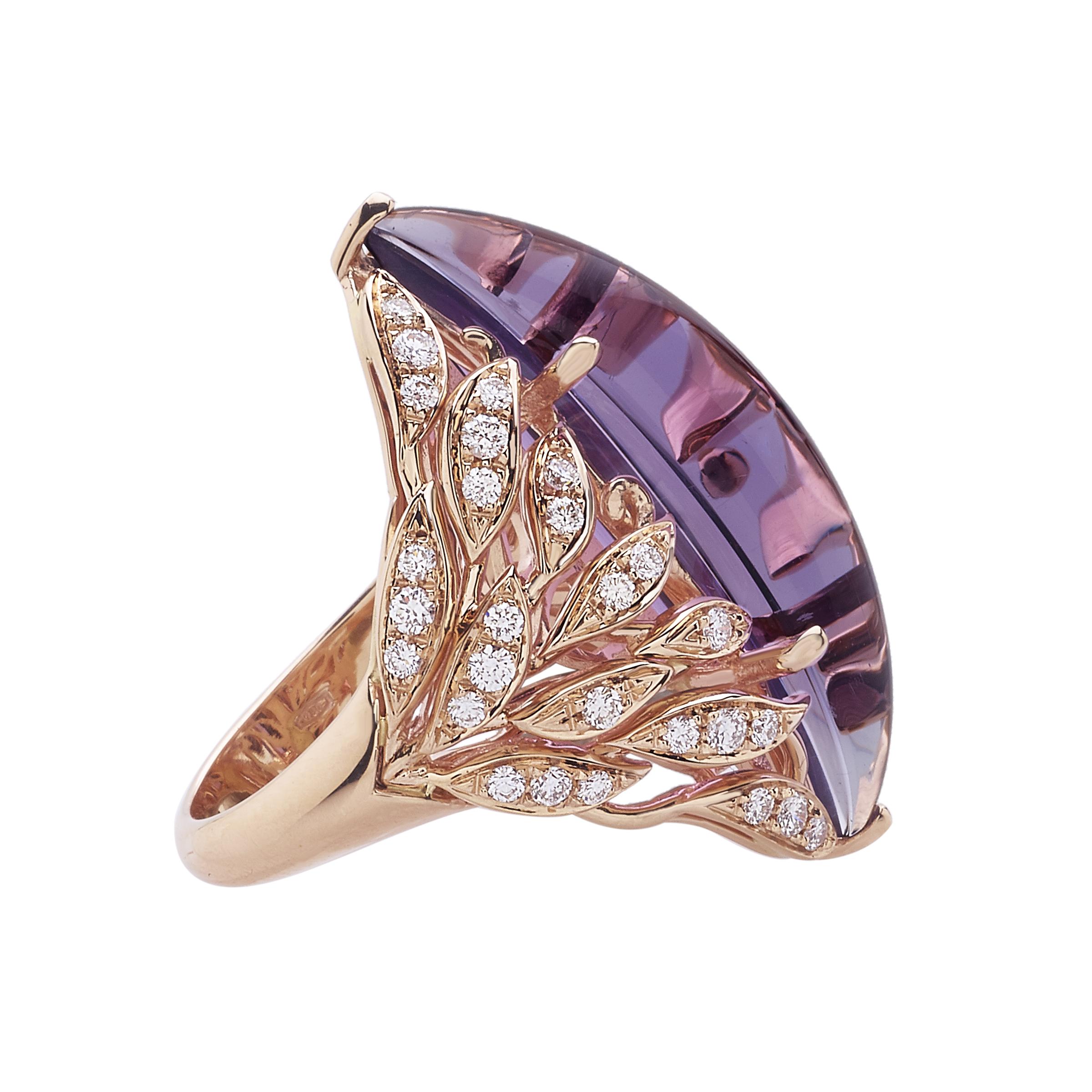 18 Carat Rose Gold Amethyst and Round Brilliant Cut Diamonds Cocktail Ring featuring 0,77 carats of white diamonds, G color, VVS clarity and a 12,33 carats cabochon cut amethyst; total piece weight 14,50 gr. Ring size 6,5 US, 53 EU
Handmade in