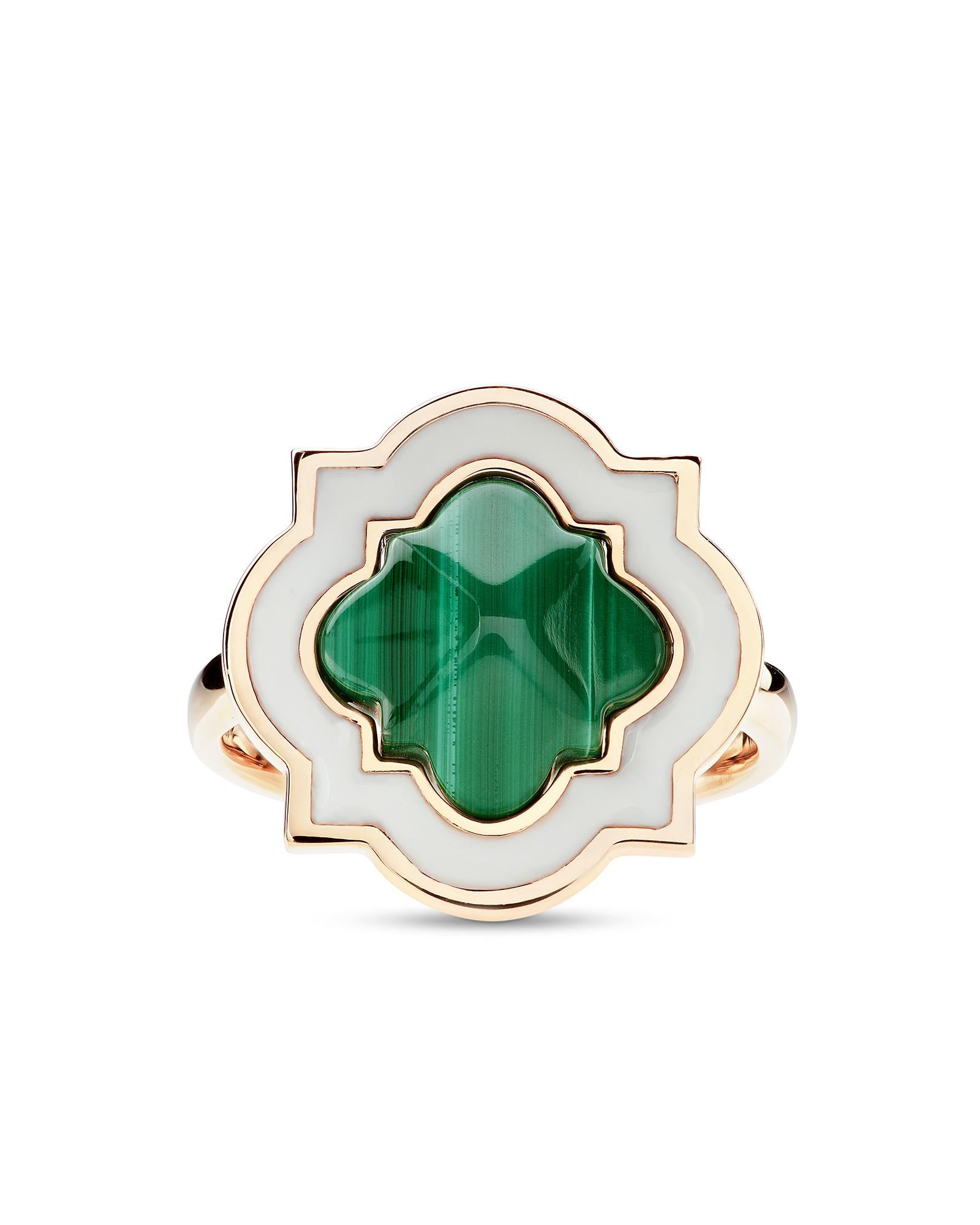 This ring with an iconic design is characterized by a bold aesthetic that combines materials, colors and essential lines. The geometeric lines reveal a fluid and sinuous trait and are animated by the intense light of the white enamel and embellished