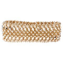 18 carat rose gold cuff bracelet designed in woven mesh