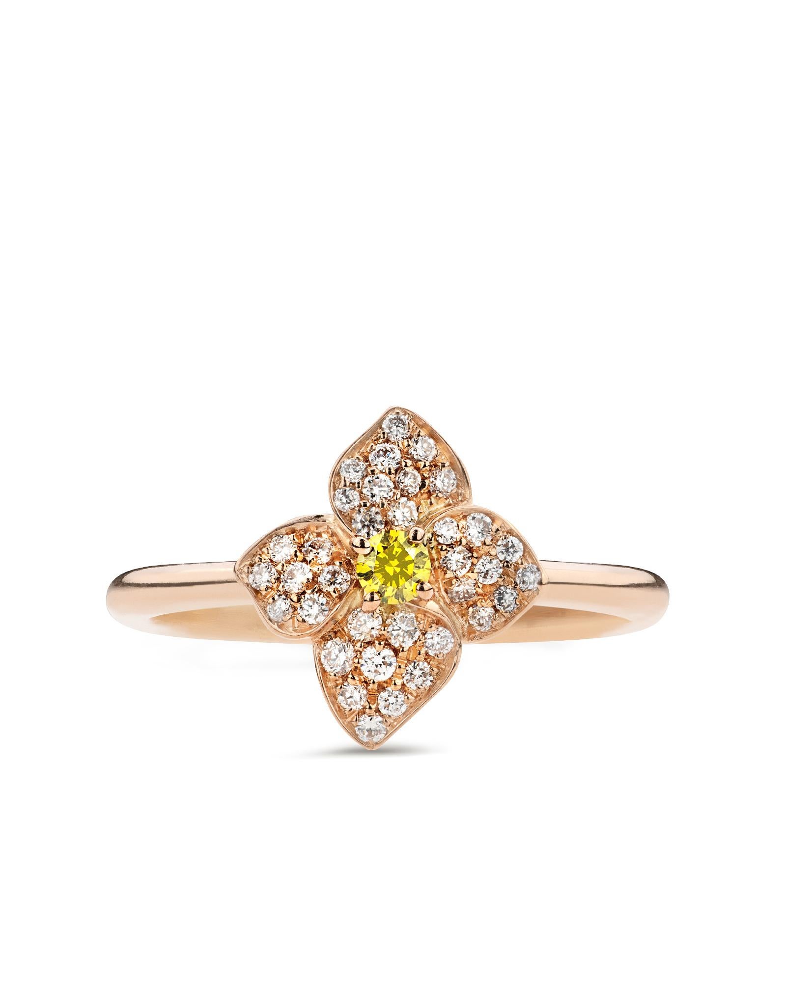 The simplicity and elegance of this ring are inspired by the floral motifs of Hortense.. The central flower is decorated with diamonds and embellished with a yellow fancy diamond that gives shine to the jewel.

Characteristics:
• 18 carat rose