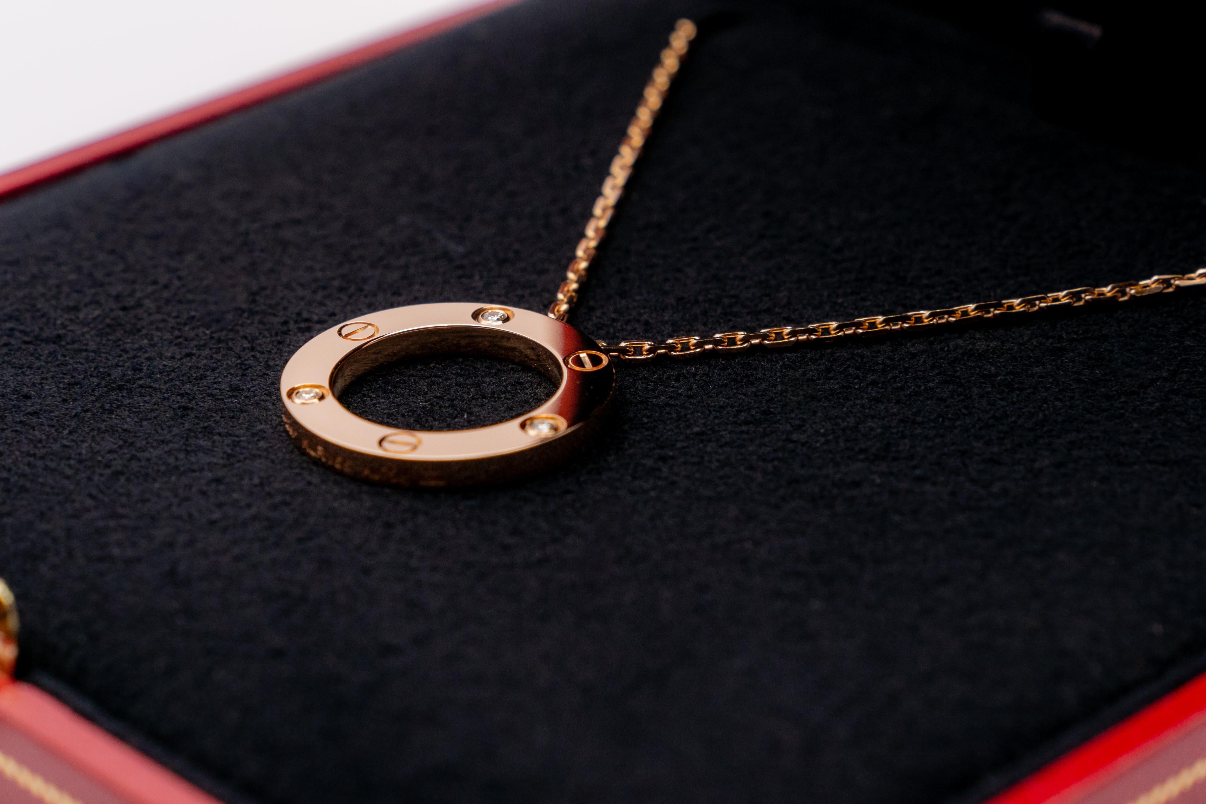 Contemporary Cartier Love 18 Carat Rose Gold Necklace; Marked Love, Diamonds Carat 0.75