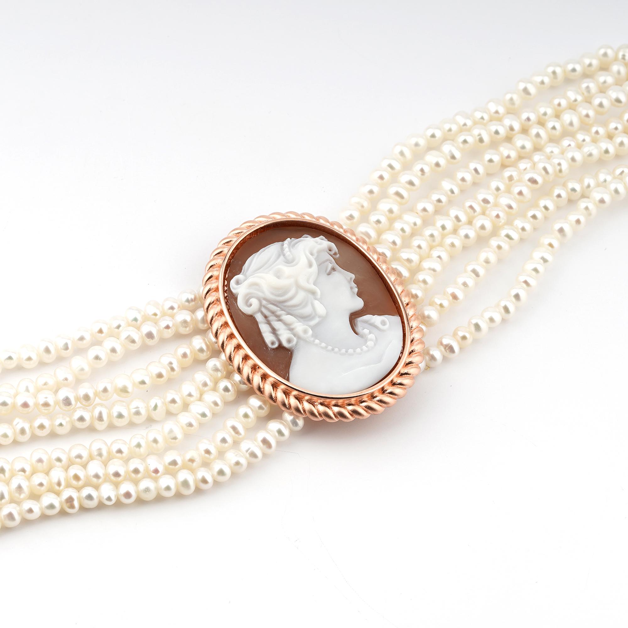18 carat Rose Gold Plated 925 Sterling Silver with 38mm Sea Shell Cameo bracelet. Fully handcarved Portrait on a sea shell cameo set in a 18kt Rose Gold plated silver Bracelet with freshwater pearls. Carvings are performed by our master artisans