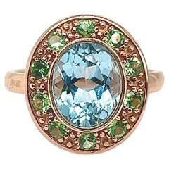 Bague en or rose 18 carats ornée d'une topaze et de tsavorite