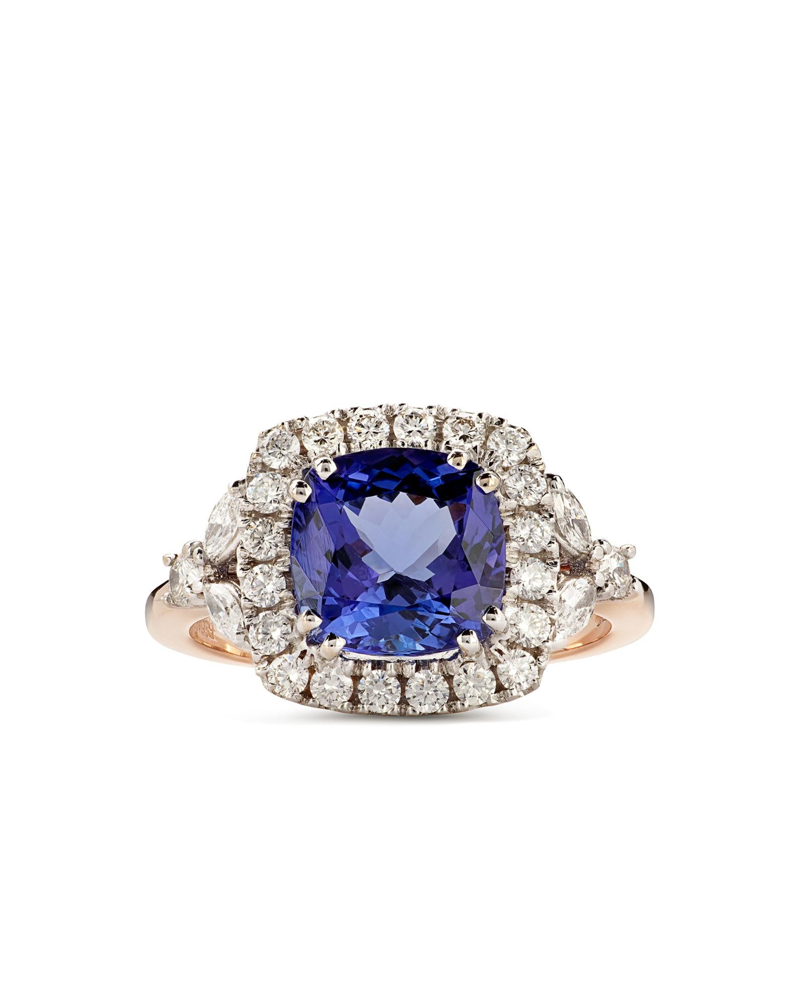 The magnetic charm of tanzanite is interpreted in a ring with a classic and sophisticated design. To crown the beautiful tanzanite blue and light purple, a round of diamonds. 
Ring made of 18K pink gold with pillow cut tanzanite and paved