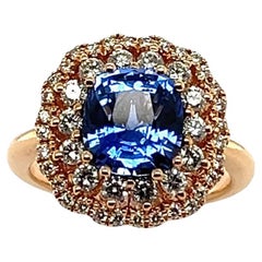 Anello in oro rosa 18 carati con zaffiro blu di Ceylon taglio cuscino e diamanti