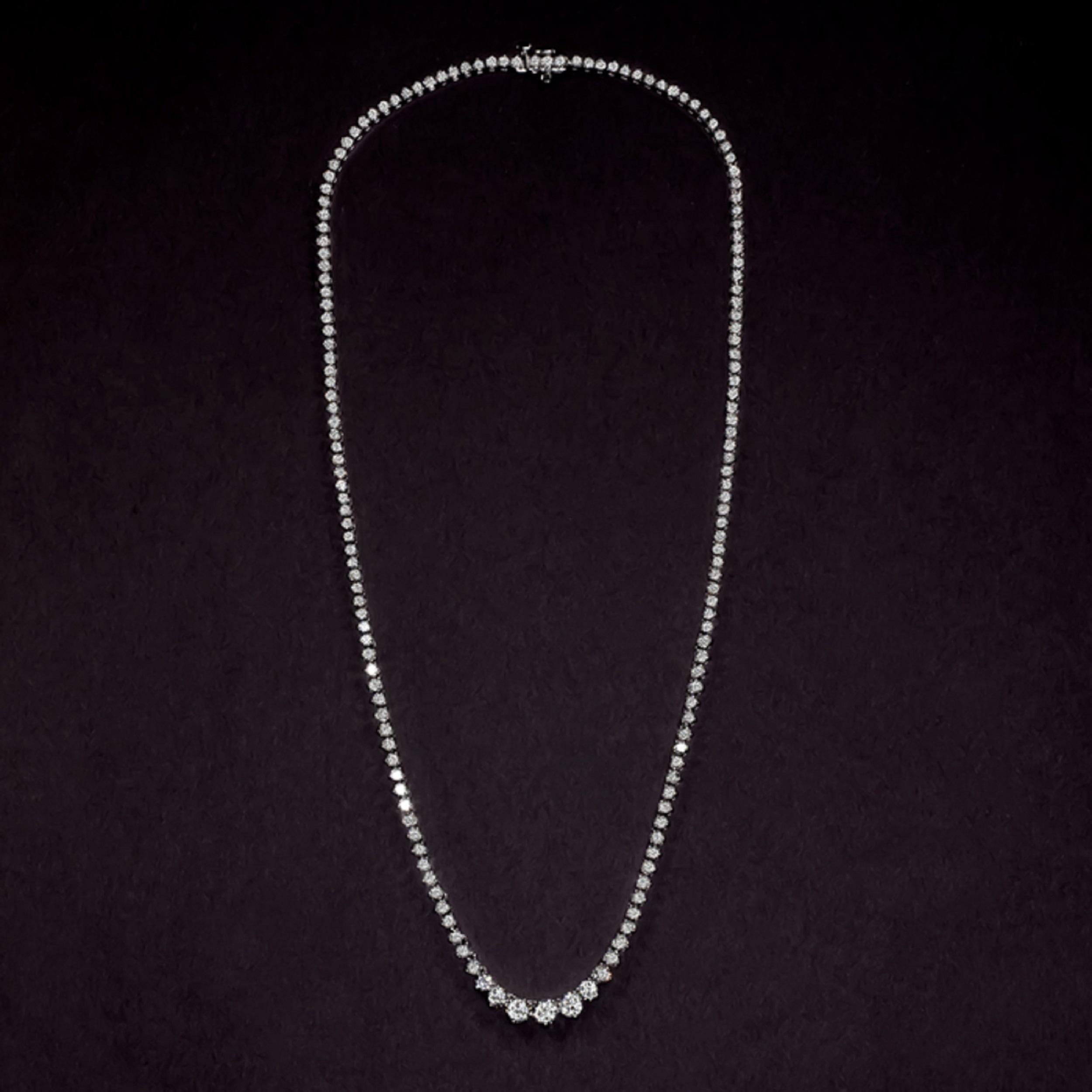 Timelessly elegant riviera necklace dazzles with 18 carats of bright white, eye clean, and excellently cut diamonds. Exceptionally well cut, these diamonds are very bright and lively! The diamonds are gracefully graduated, and overall, the necklace