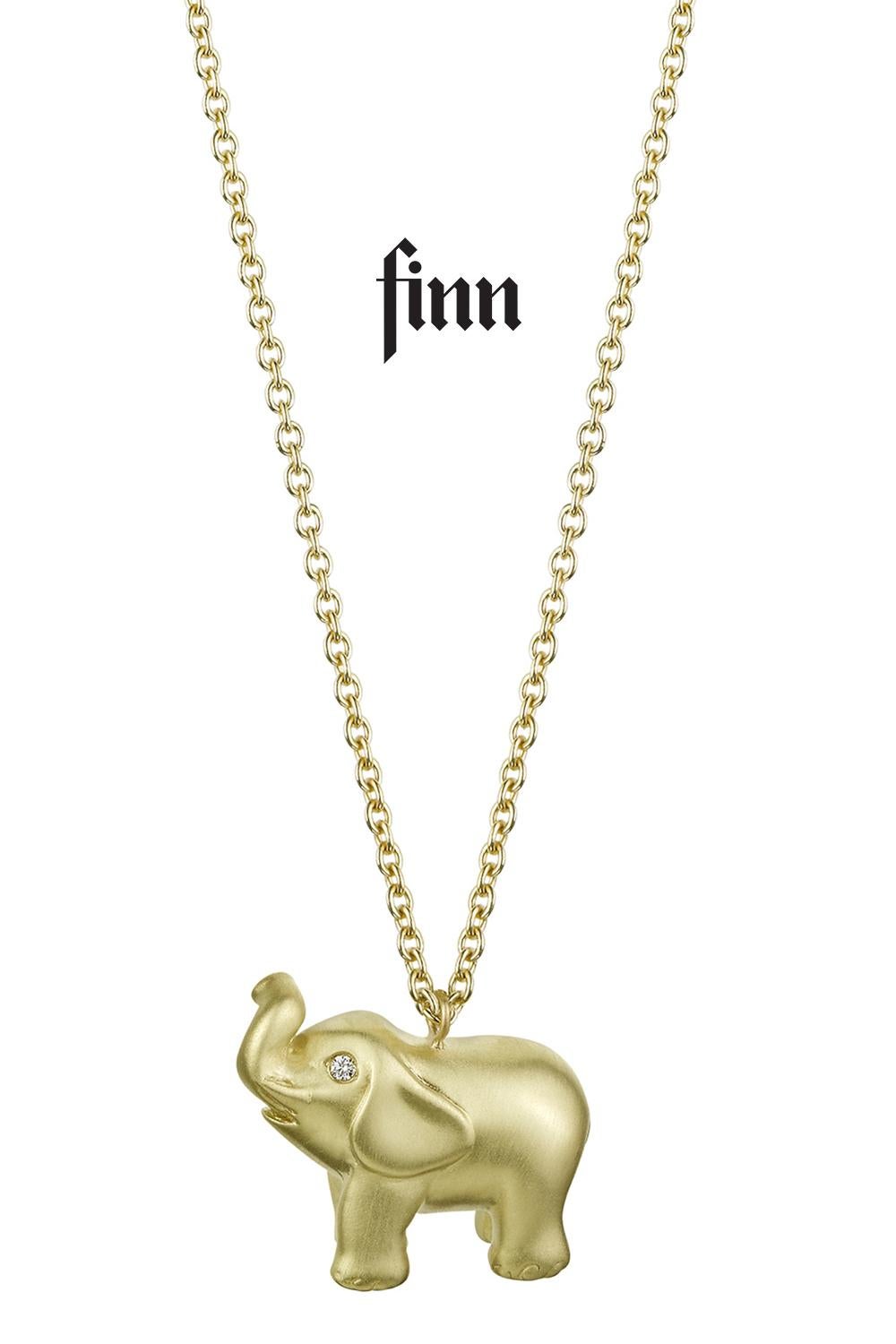 Elephants are good luck! Especially in 18 karat yellow gold. This cutie is solid gold and heavy. The pendant is 17mm long and 7.45mm wide with .02 carats of diamonds in the eyes. The pendant hangs on a 20
