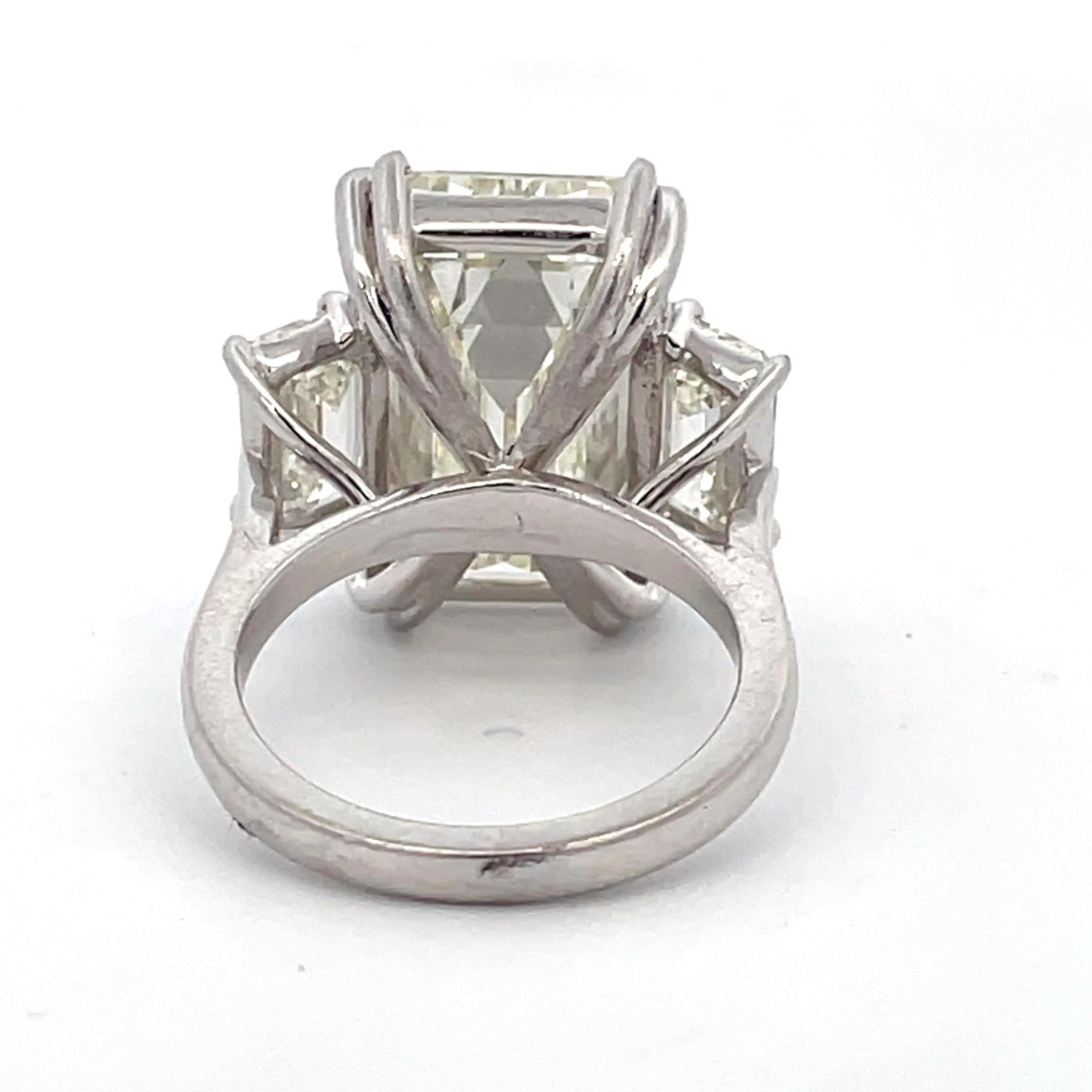 Modern 18 carat three stone engagement ring For Sale