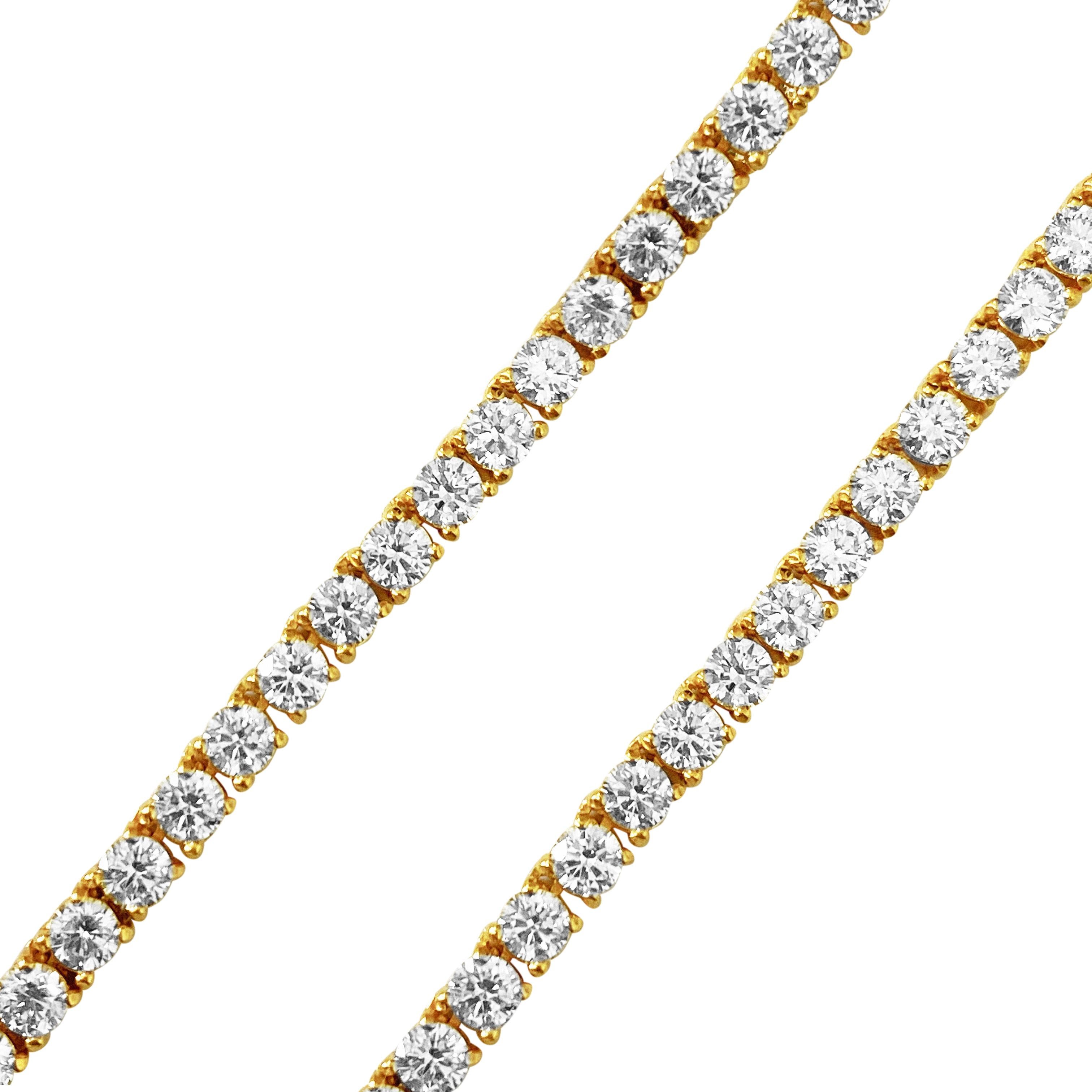 This necklace is made of 14-karat yellow gold. It has a total of 18 carats of diamonds, which are clear and shiny. The diamonds are cut in a round and brilliant way, each measuring 3.2mm. There are 128 diamonds in total, securely set with prongs.