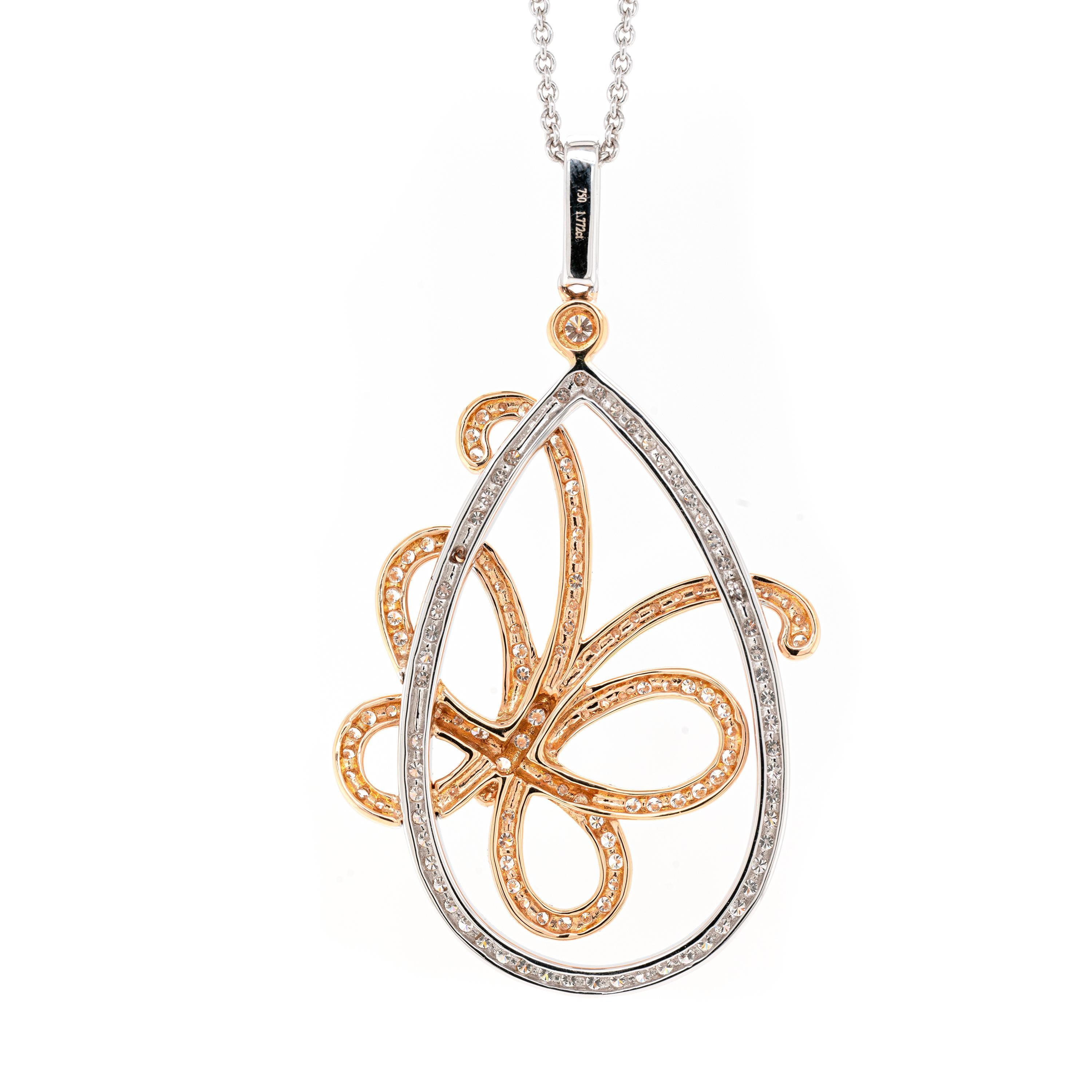 This lovely necklace features a wonderful 18 carat white gold open work teardrop pendant beautifully decorated with a delicate 18 carat rose gold butterfly, known to symbolise hope and rebirth. Fine quality round brilliant cut diamonds scintillate