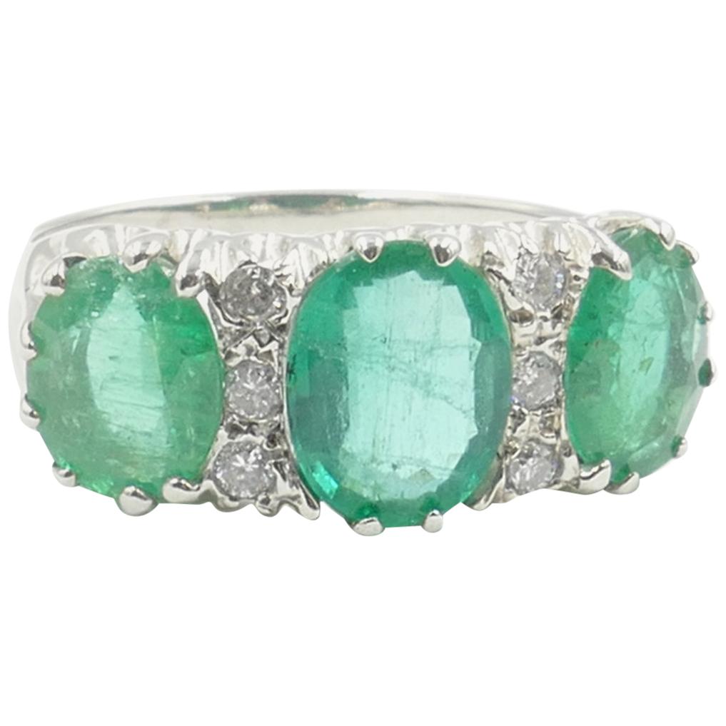 18 Carat White Gold 3 Emerald and Diamond Bridge Ring
