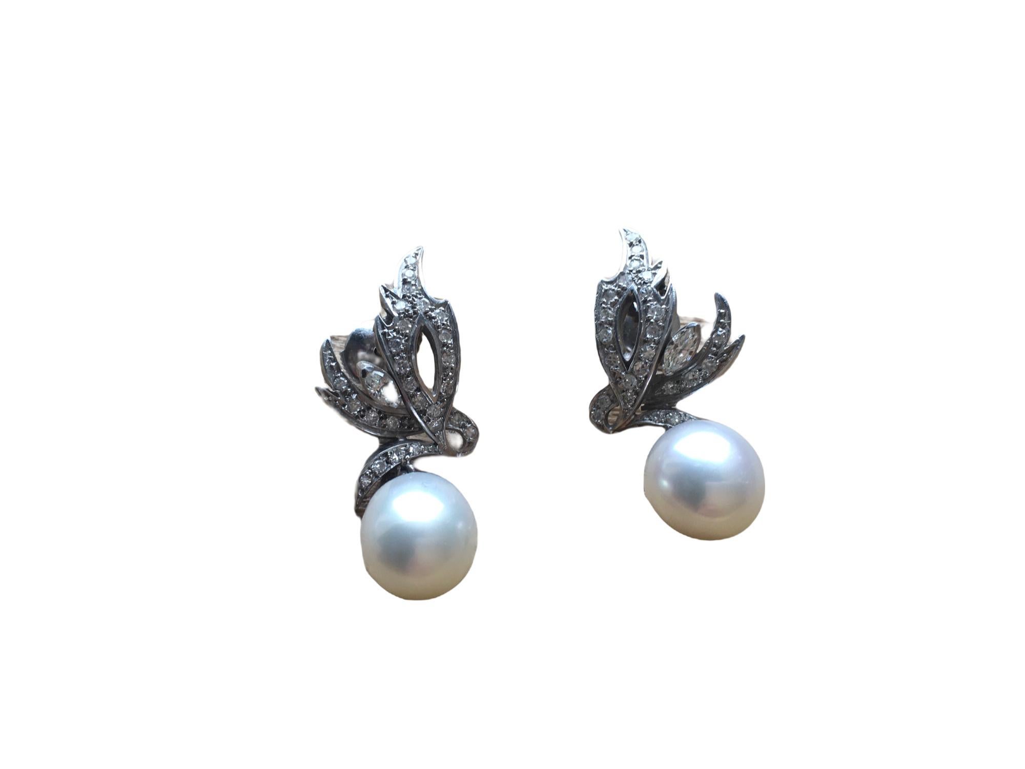 18 carat white gold Akoya cultured pearl diamond drop earrings 
With GIA certificate dated8 September 2017
Estimated total diamond weight 1.1 carat
Weight 12 grams
In very good condition 
No missing stones. 