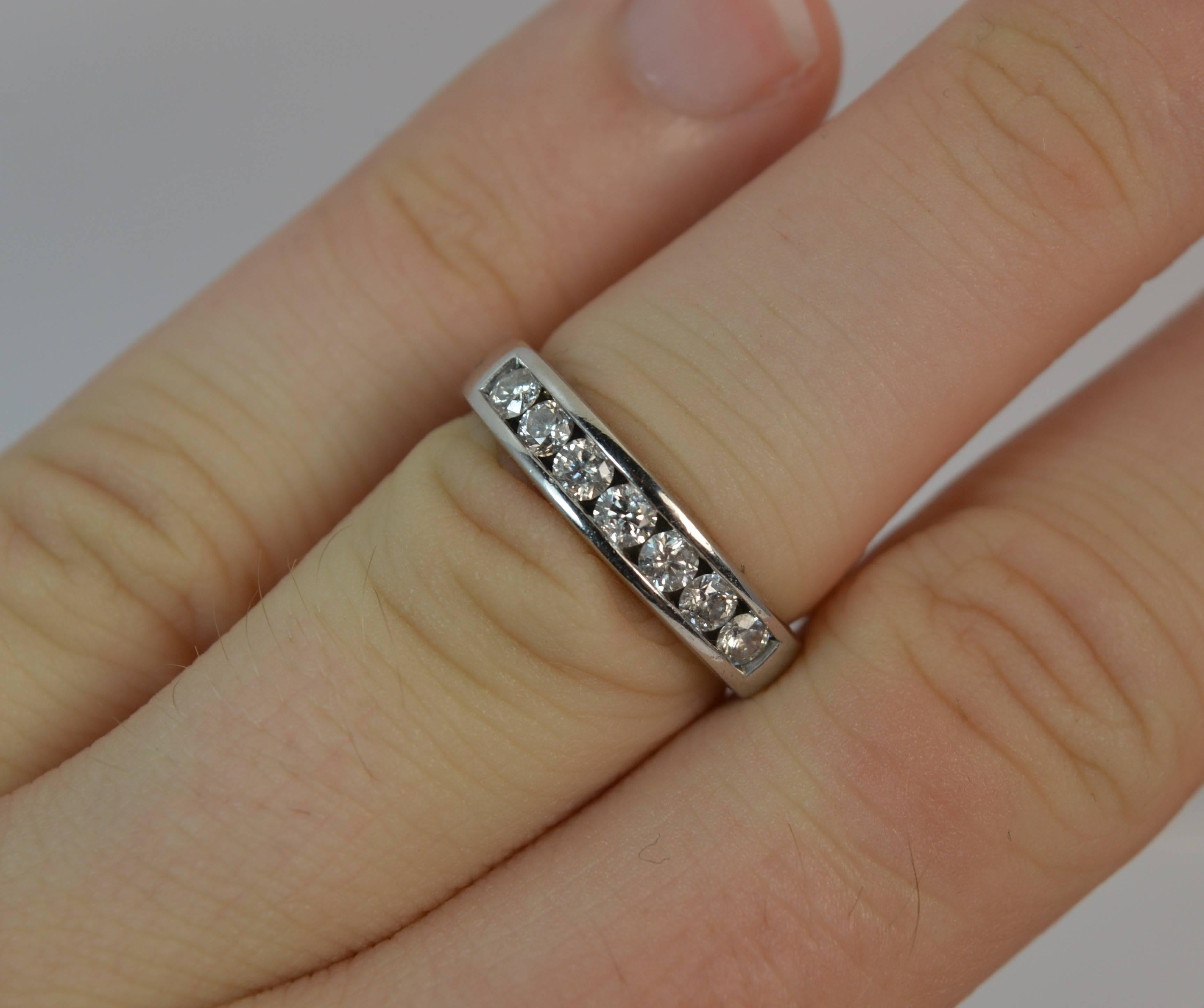 
A lovely ladies diamond half eternity stack ring.

Solid 18 carat white gold example.

​Set with 7 round brilliant cut natural diamonds to total 0.50 carats as marked to the shank. 

​17mm spread of stones. 4.1mm thick band to front.


CONDITION ;