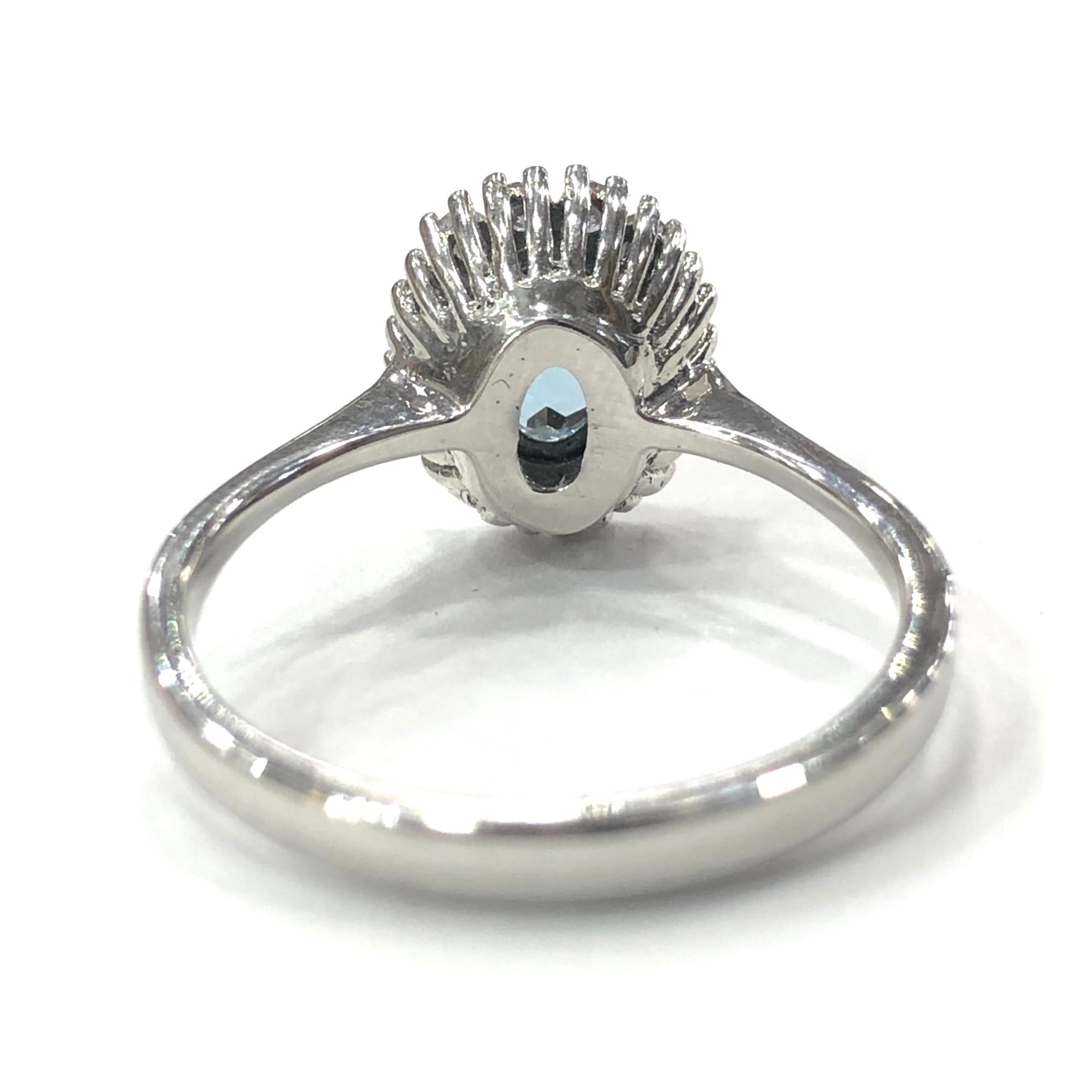 Oval Cut 18 Carat White Gold Aquamarine and Diamond Cluster Ring