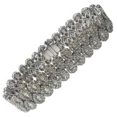 18 Carat White Gold Baguette and Round Brilliant Cut Diamond Bracelet