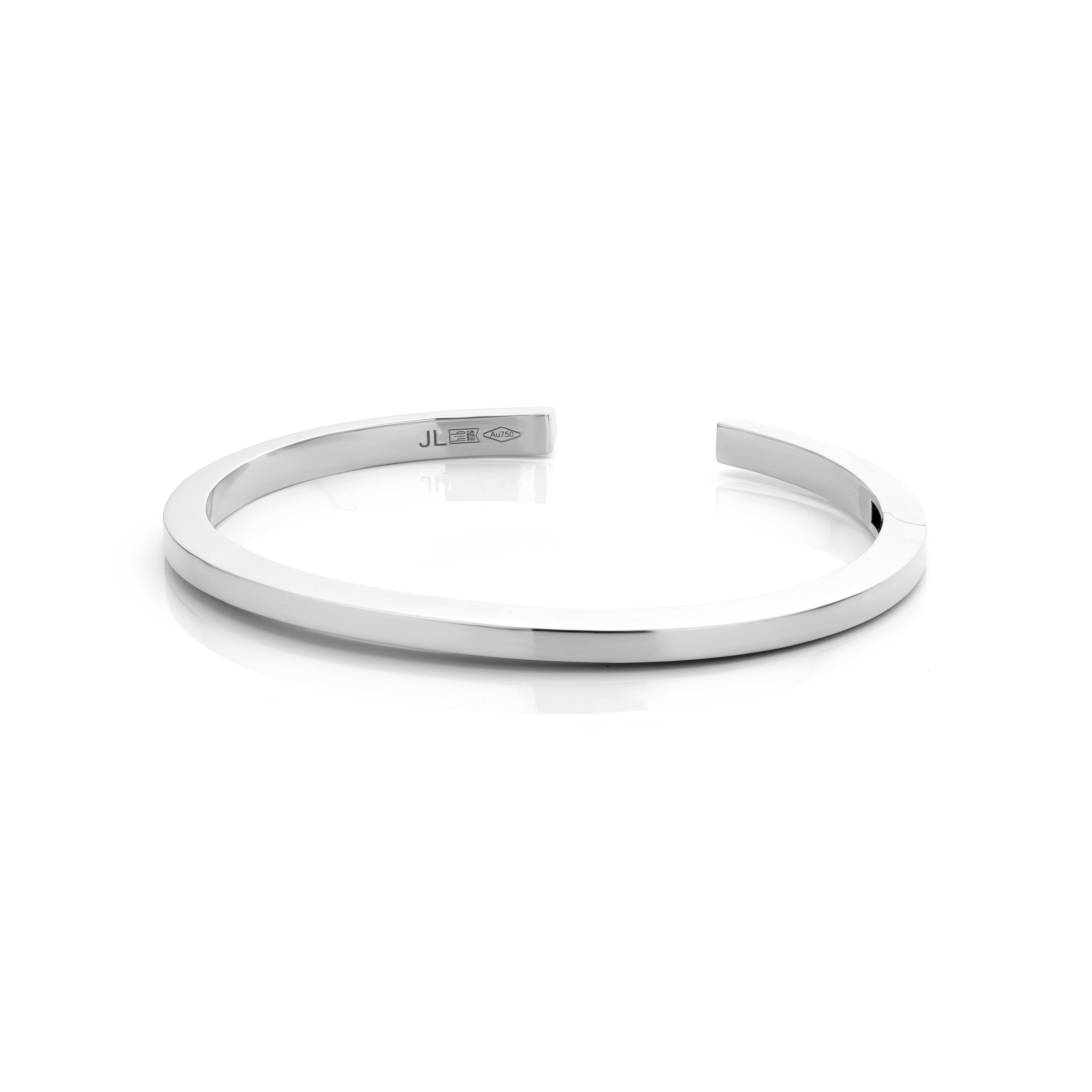18 Karat White gold Bracelet, completed with a sandblasted surface.

This design is one of Jochen Leen's first designs and is highly recognizable.
This bracelet is well suited to be worn as an every day bracelet and is easy to match with other fine