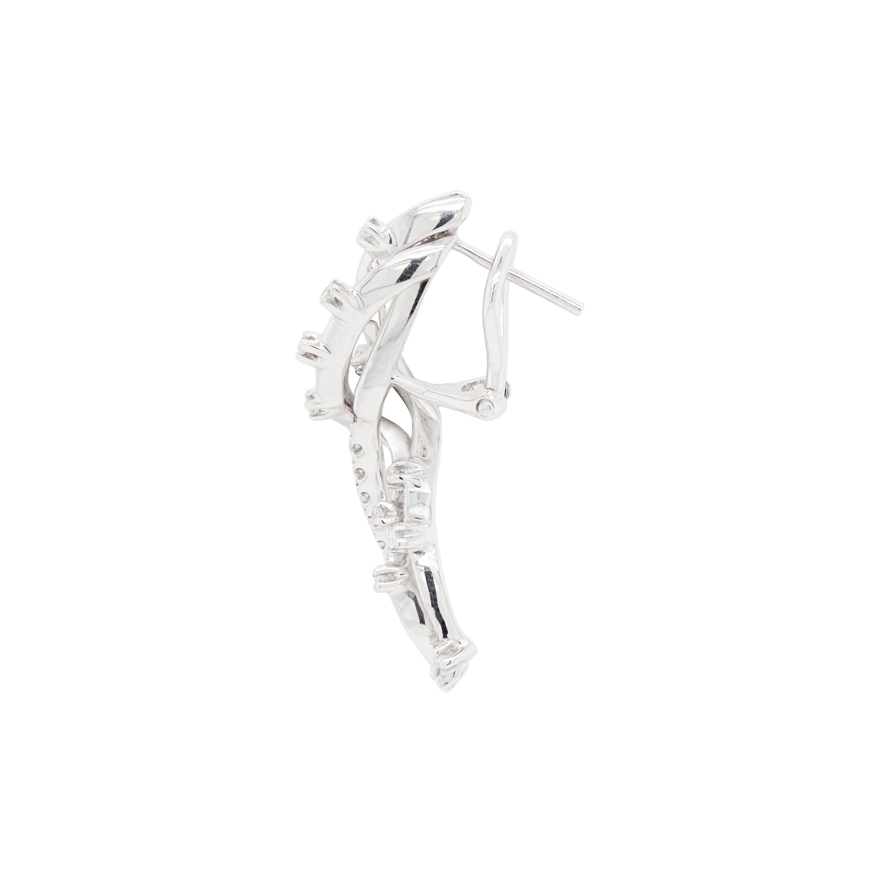 Step into a world of elegance with these absolutely fantastic 18 carat white gold diamond spray earrings, finely created for pierced ears.

Intricately designed to mimic the delicate beauty of cascading white gold twisted branches, these earrings