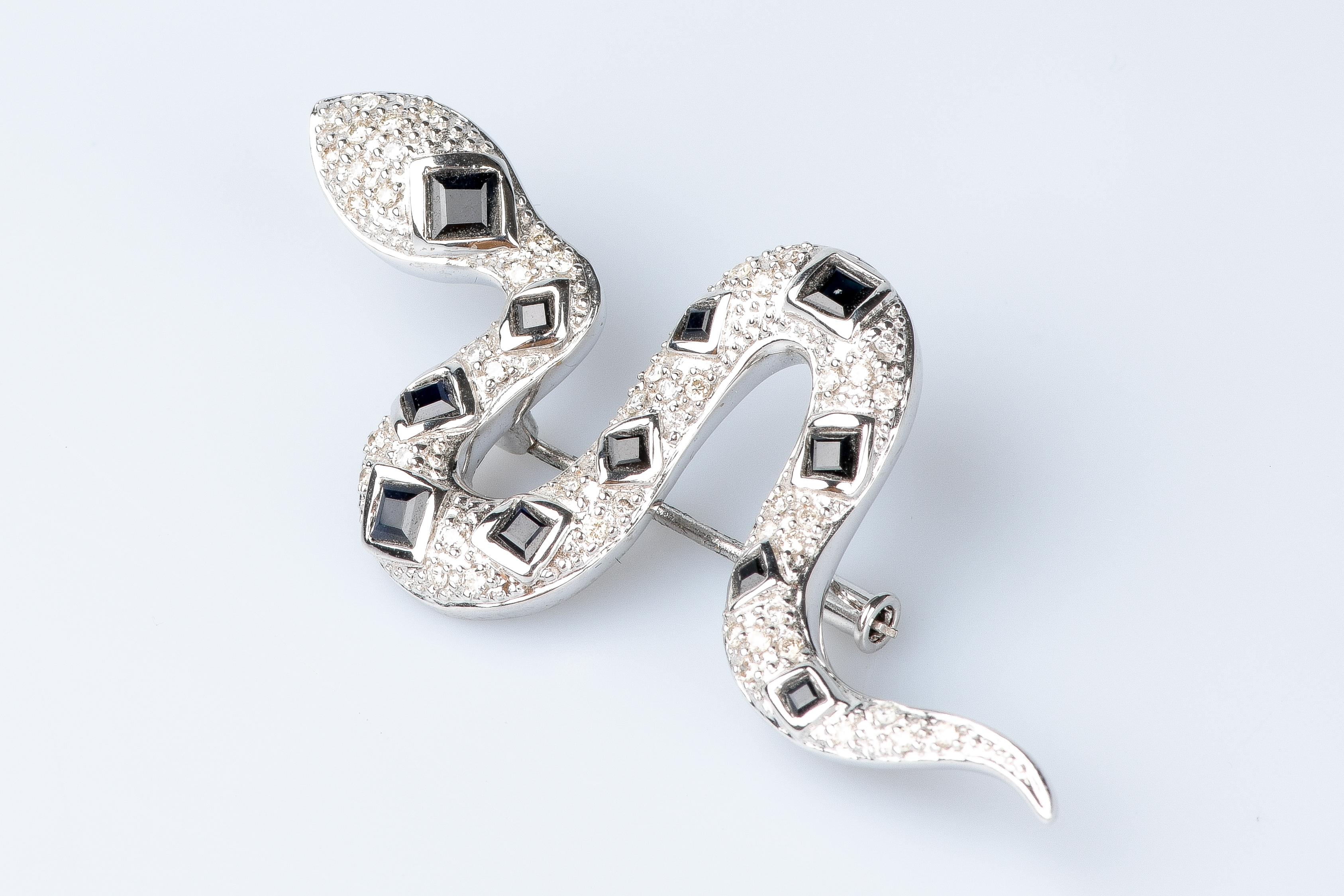 18 carat white gold diamonds and sapphires snake brooch For Sale 1