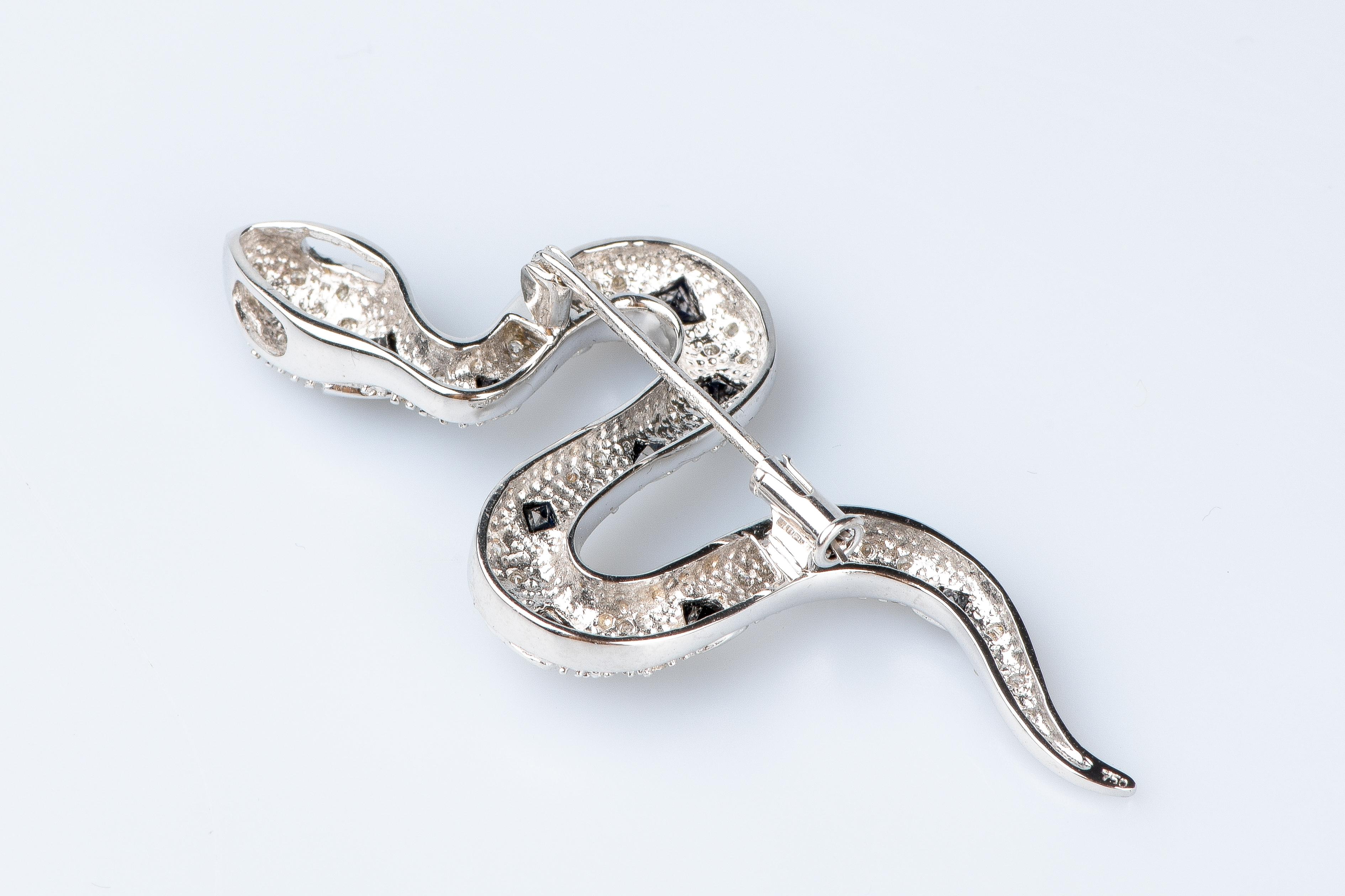 18 carat white gold diamonds and sapphires snake brooch For Sale 2