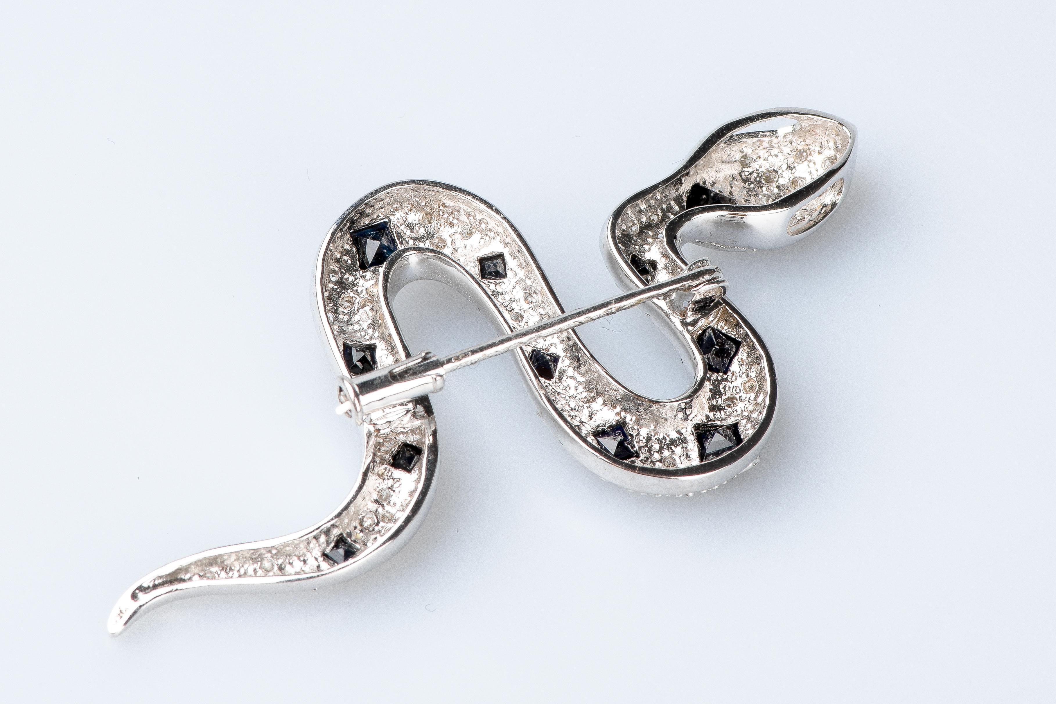18 carat white gold diamonds and sapphires snake brooch For Sale 3
