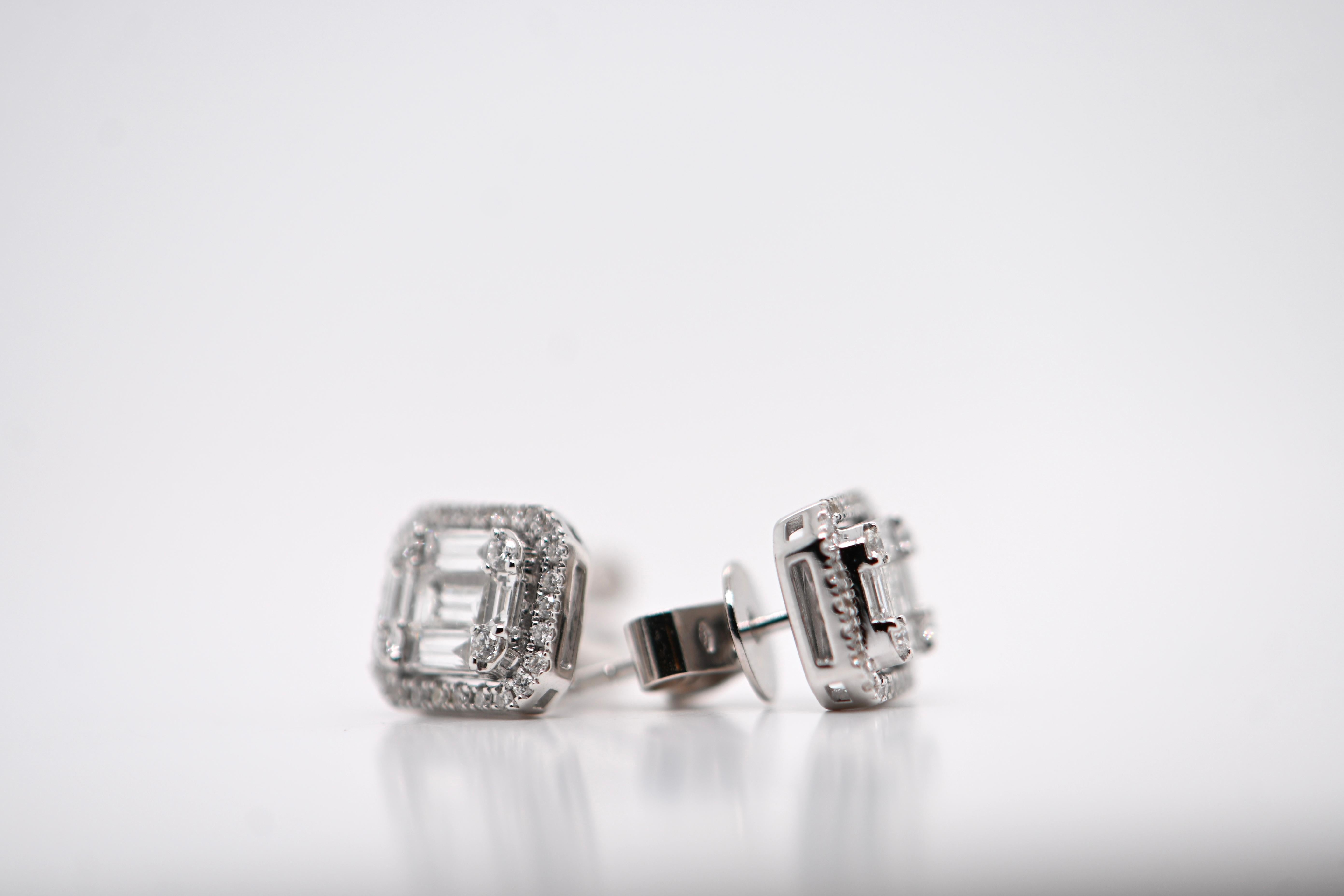 Indulge in timeless elegance with these exquisite 18-carat white gold earrings, adorned with 70 stunning diamonds totaling 0.70 carats and boasting a dazzling G color grade. Most of the diamonds are brilliant-cut, creating a radiant sparkle, while