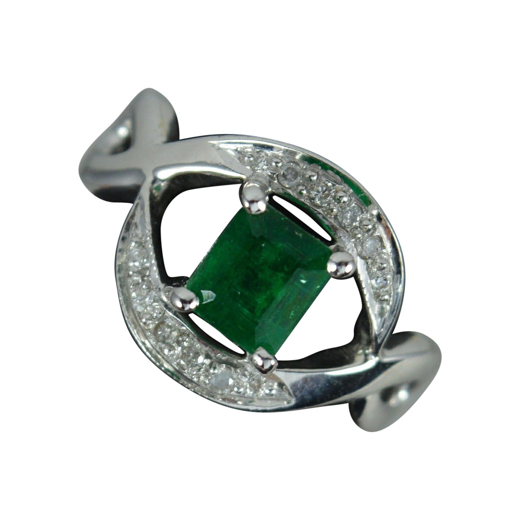 18 Carat White Gold Emerald and Diamond Cluster Ring