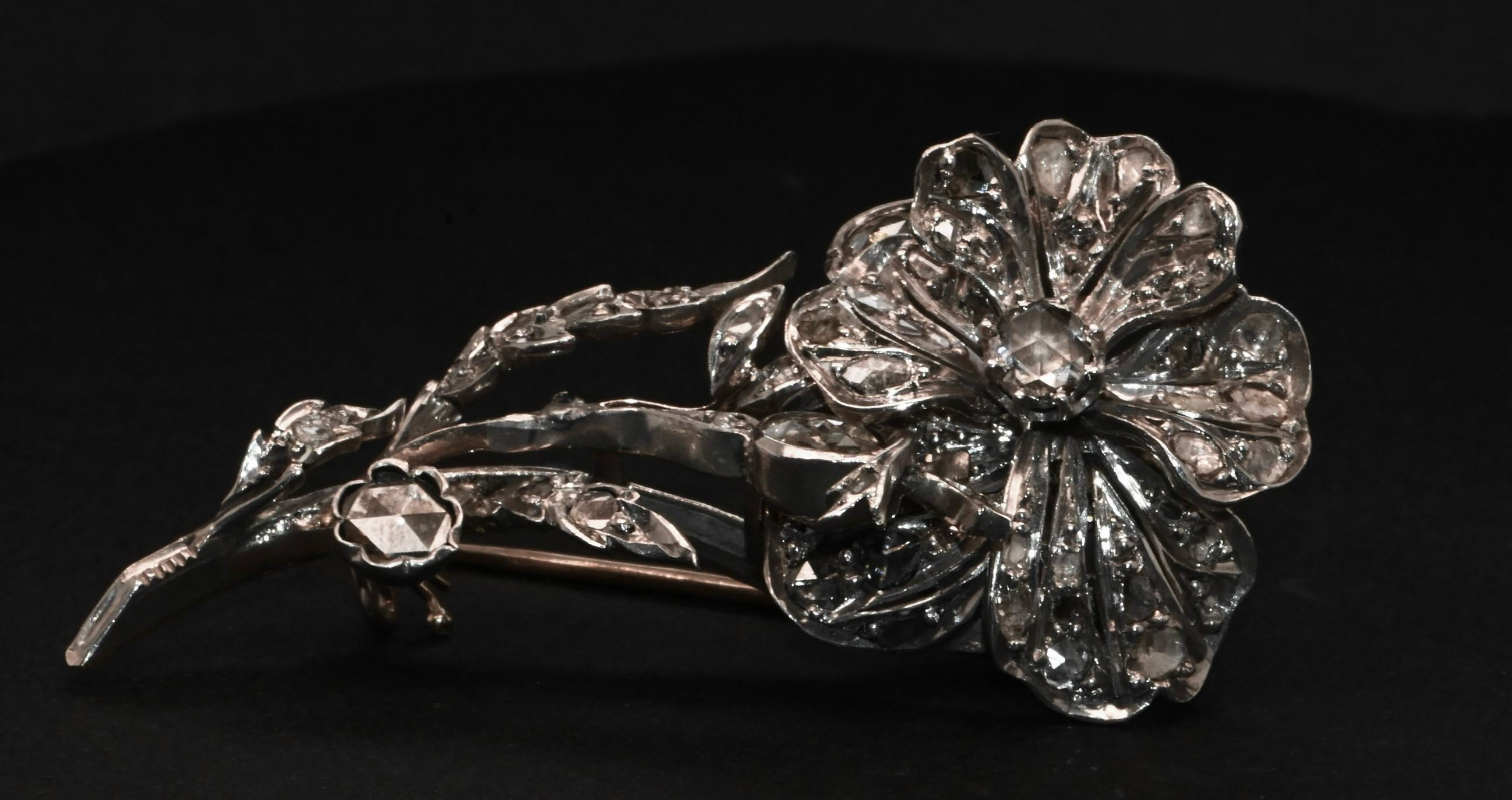 18 Carat White Gold Flower Brooch Adorned With Diamonds For Sale 1