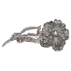 18 Carat White Gold Flower Brooch Adorned With Diamonds