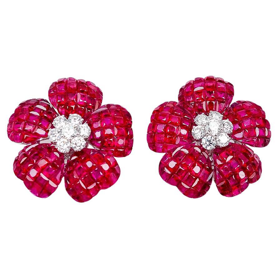 Boucles d
oreilles invisibles fleur en or blanc 18 carats, rubis et diamants