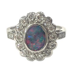 18 Carat White Gold Opal and Diamond Cluster Ring