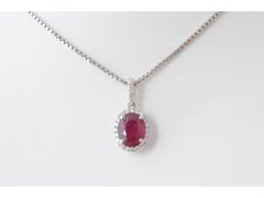 18 carat white gold pendant with diamonds and ruby