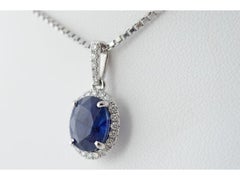 18 Carat White Gold Pendant with Diamonds and Sapphire