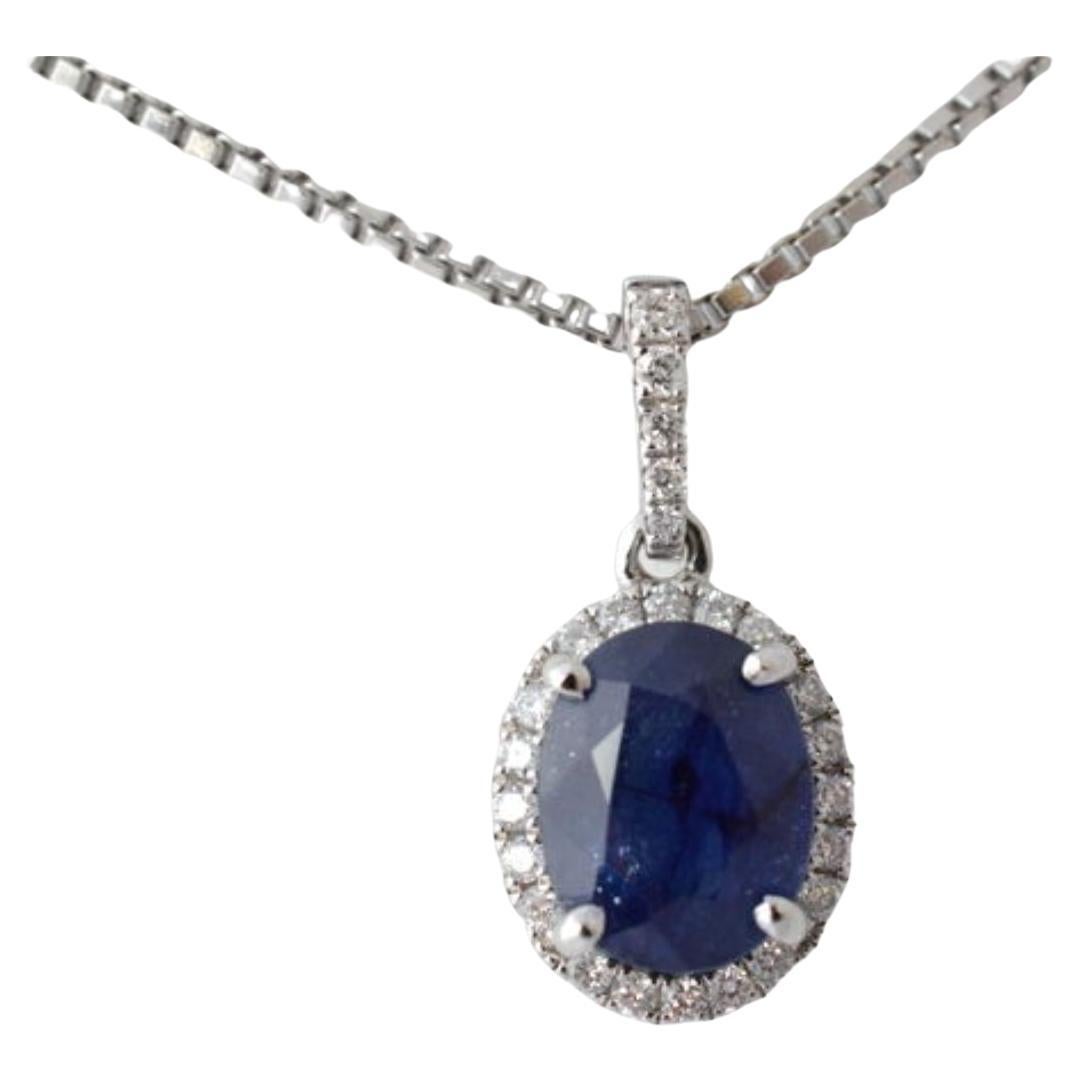 18 Carat White Gold Pendant with Diamonds and Sapphire For Sale