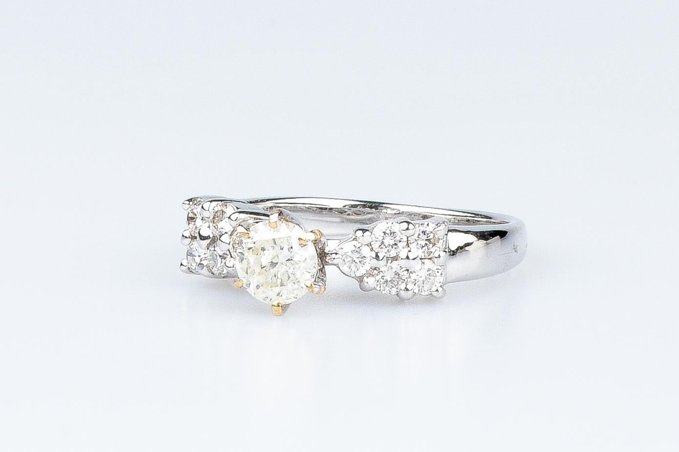 18 carat white gold ring designed with round brillant cut diamonds For Sale 5