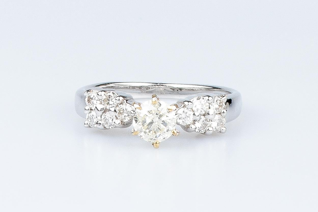 18 carat white gold ring designed with round brillant cut diamonds For Sale 7
