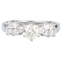 18 carat white gold ring designed with round brillant cut diamonds