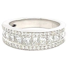 18 Carat White Gold Ring Set with Princess and Brilliant Cut Diamonds