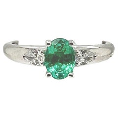 18-Carat White Gold Ring with 0.81 carat Emerald and 0.22 carat Diamonds