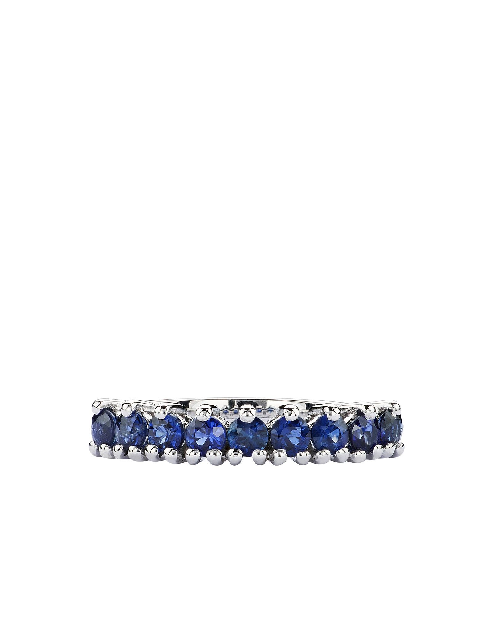 An elegant band ring with fine lines, embellished with a composition of blue sapphires capable of giving elegance and brightness. The ring can be combined with other rings of the same line with different colors. 

Characteristics:
• 18 carat white