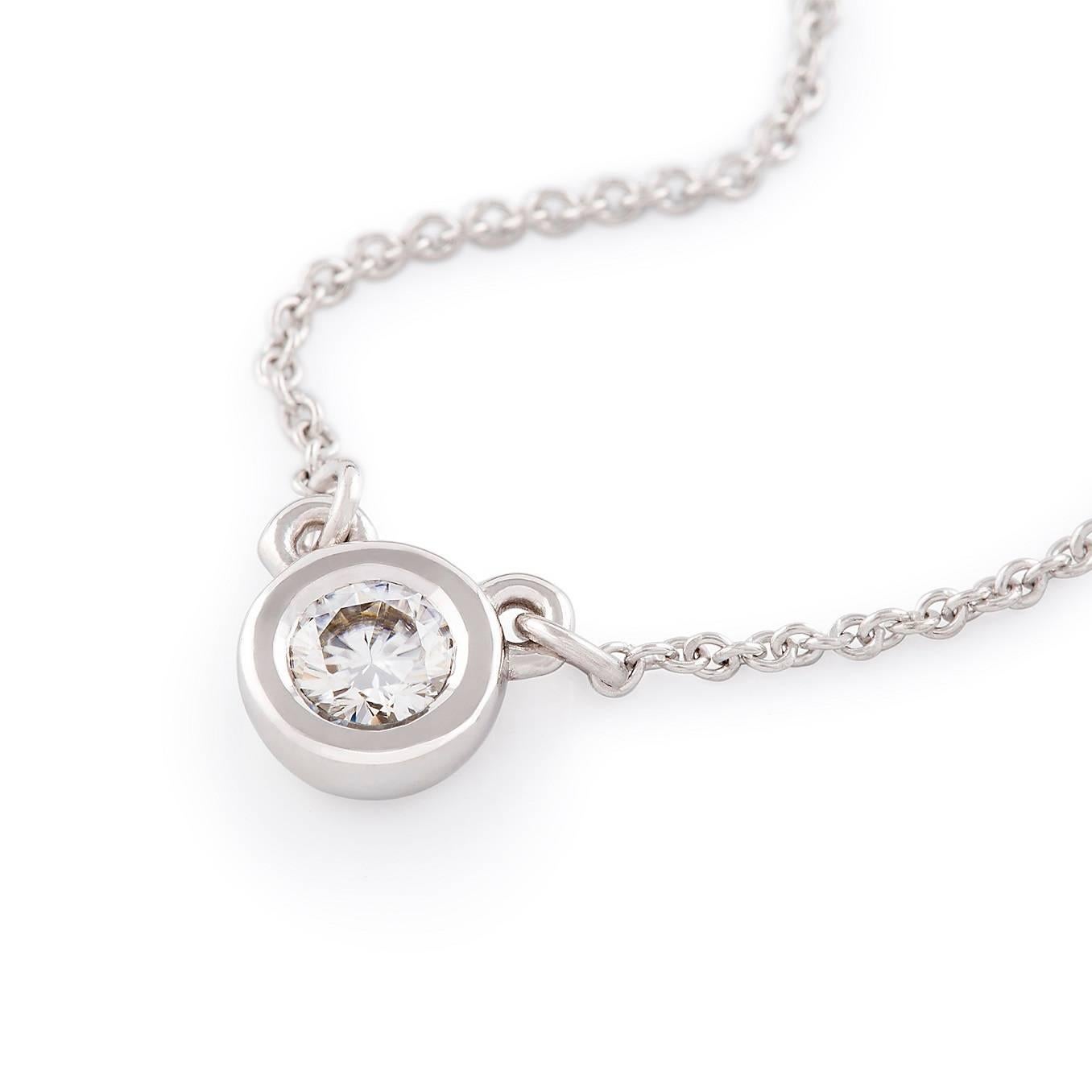 Diamond Necklace

This gorgeous petite pendant features a stunning  diamond. The circular setting is suspended from an elegant cable chain.

Round brilliant cut diamonds: I color, SI clarity, 0.37 Carat diamond weigh

Weight: 3.60 grams

 