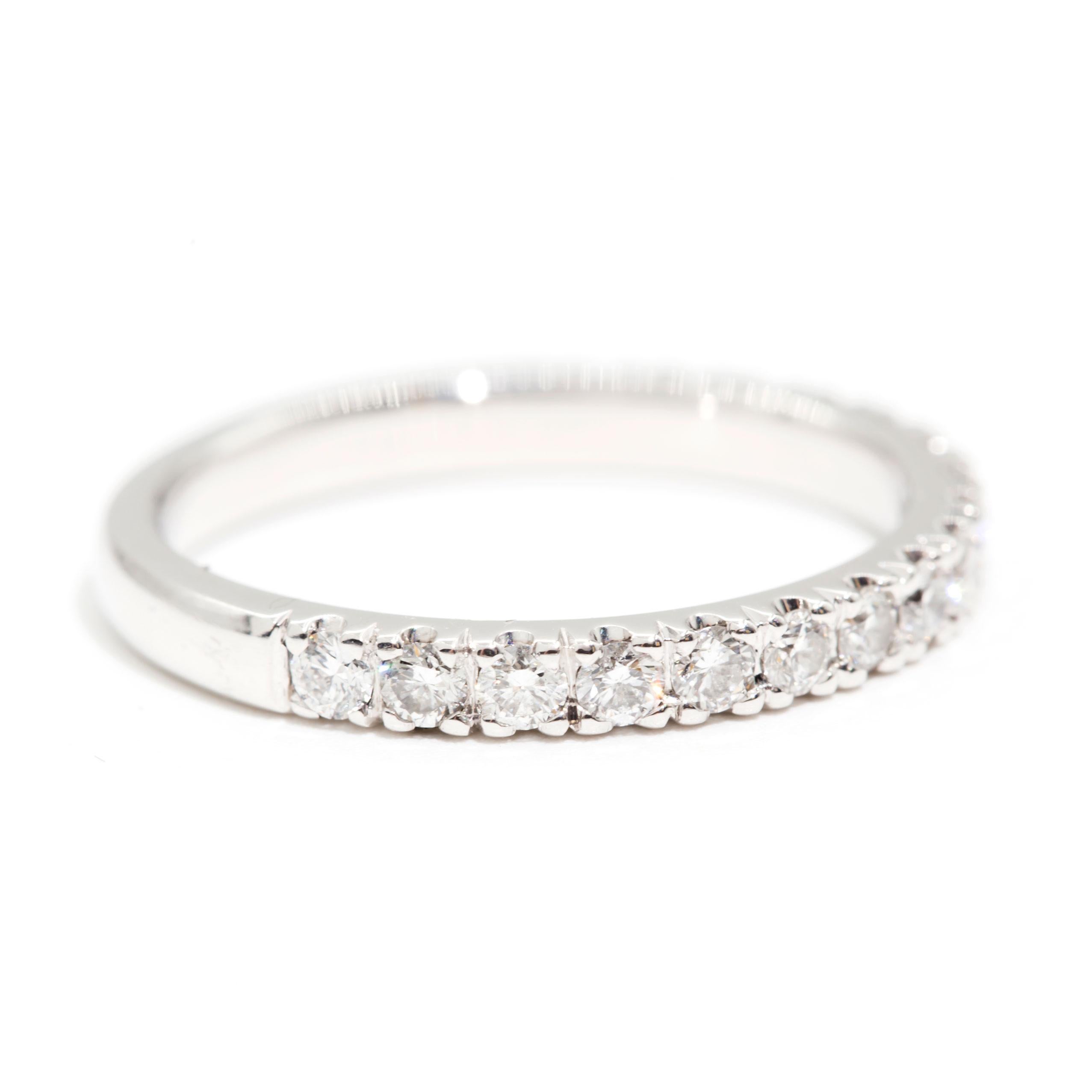 Carefully crafted in 18 carat white gold this timeless eternity bridal ring features seventeen glittering round brilliant cut claw set diamonds.  We have named this sweet ring The Jean Ring. The Jean Ring sits low to the finger so she is ever so