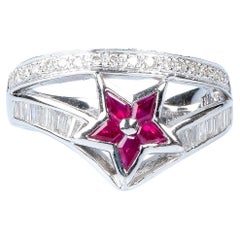 18 carat white gold rubies and diamonds star ring