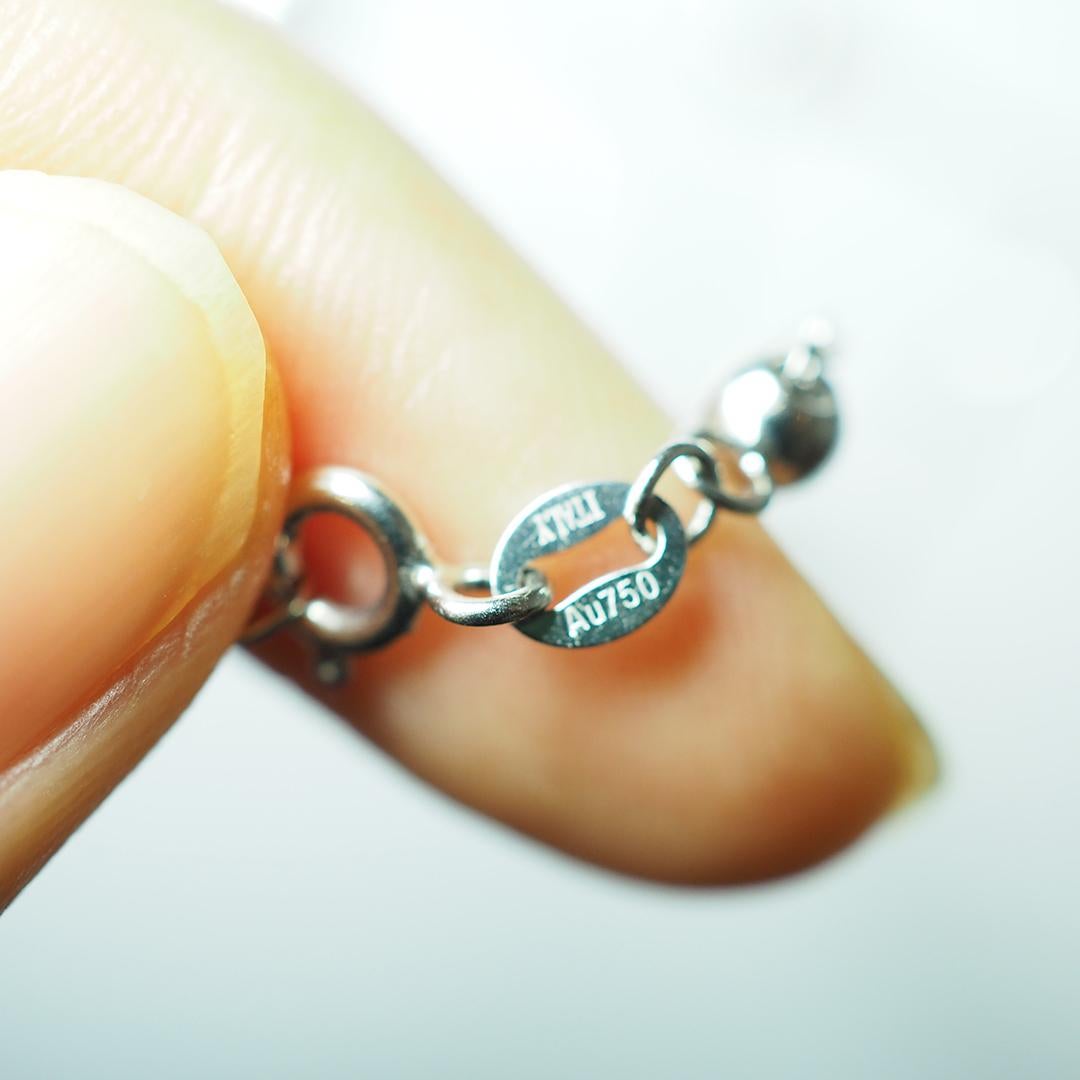 Quadrato Collana a cuore in oro bianco 18 carati con rubini e diamanti e incastonatura invisibile in vendita