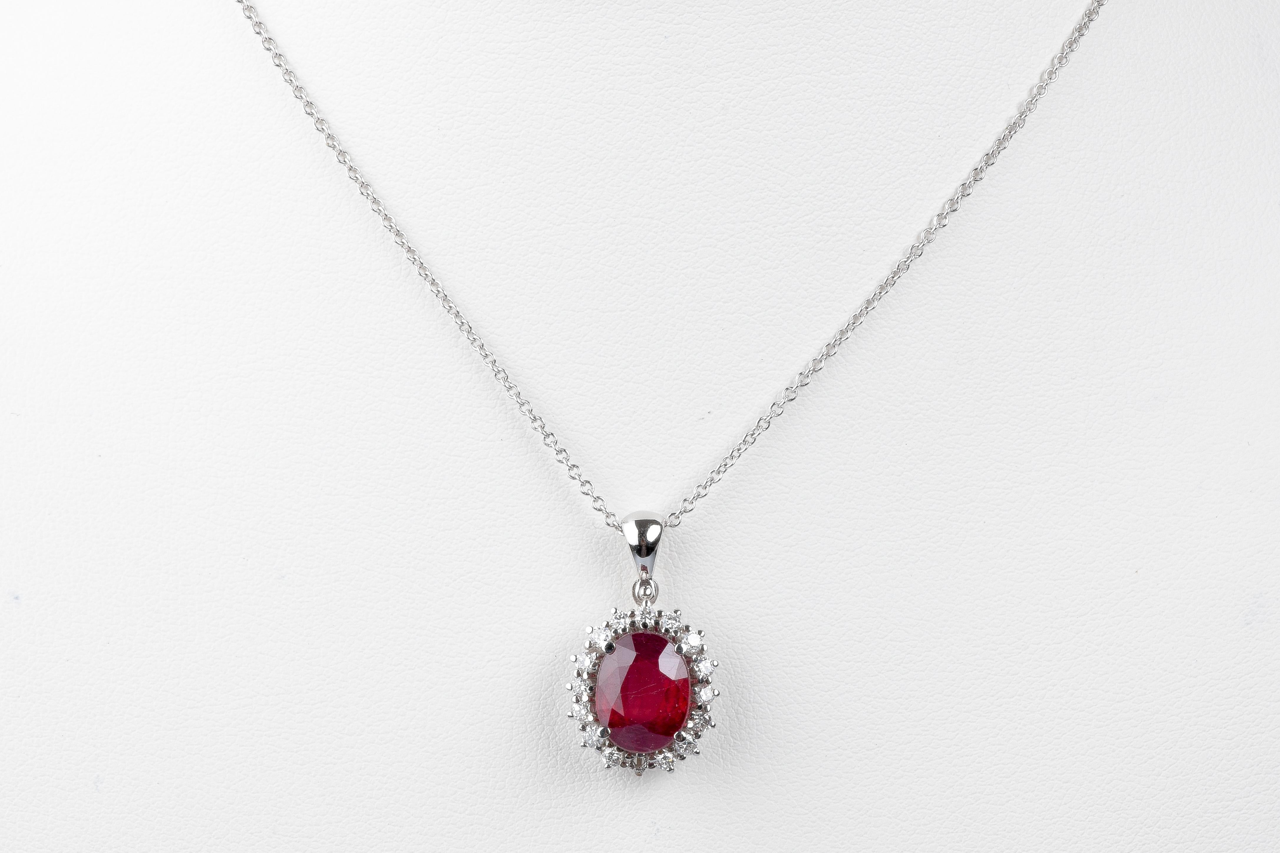 Oval Cut 18 carat white gold ruby and diamonds necklace For Sale