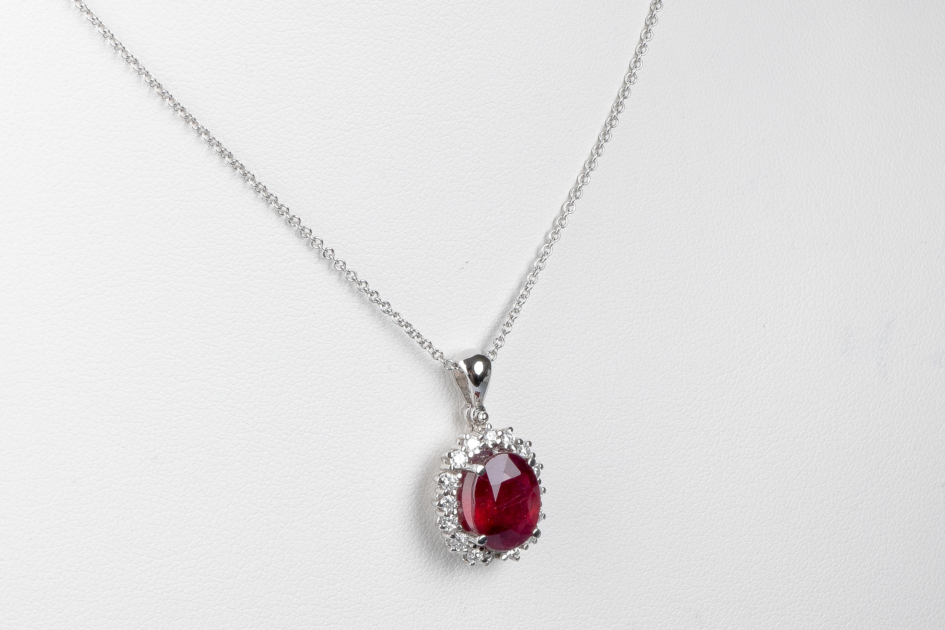 Women's 18 carat white gold ruby and diamonds necklace For Sale