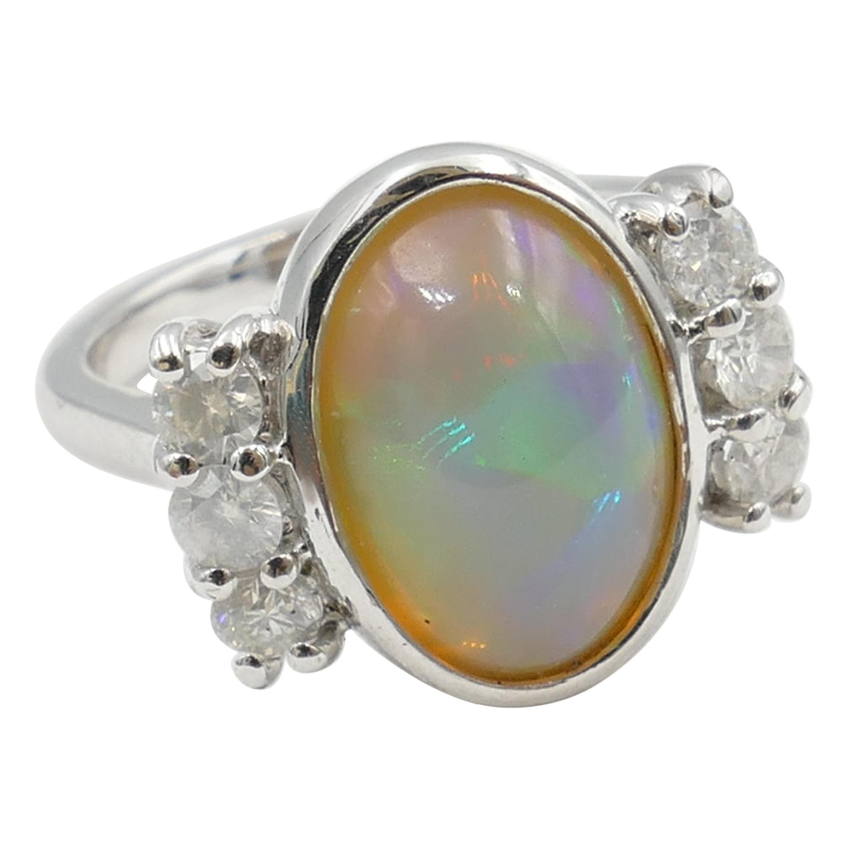 18 Carat White Gold Solid Opal and Diamond Ring For Sale