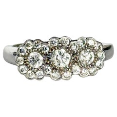 18 Carat White Gold Triple Cluster Diamond Ring