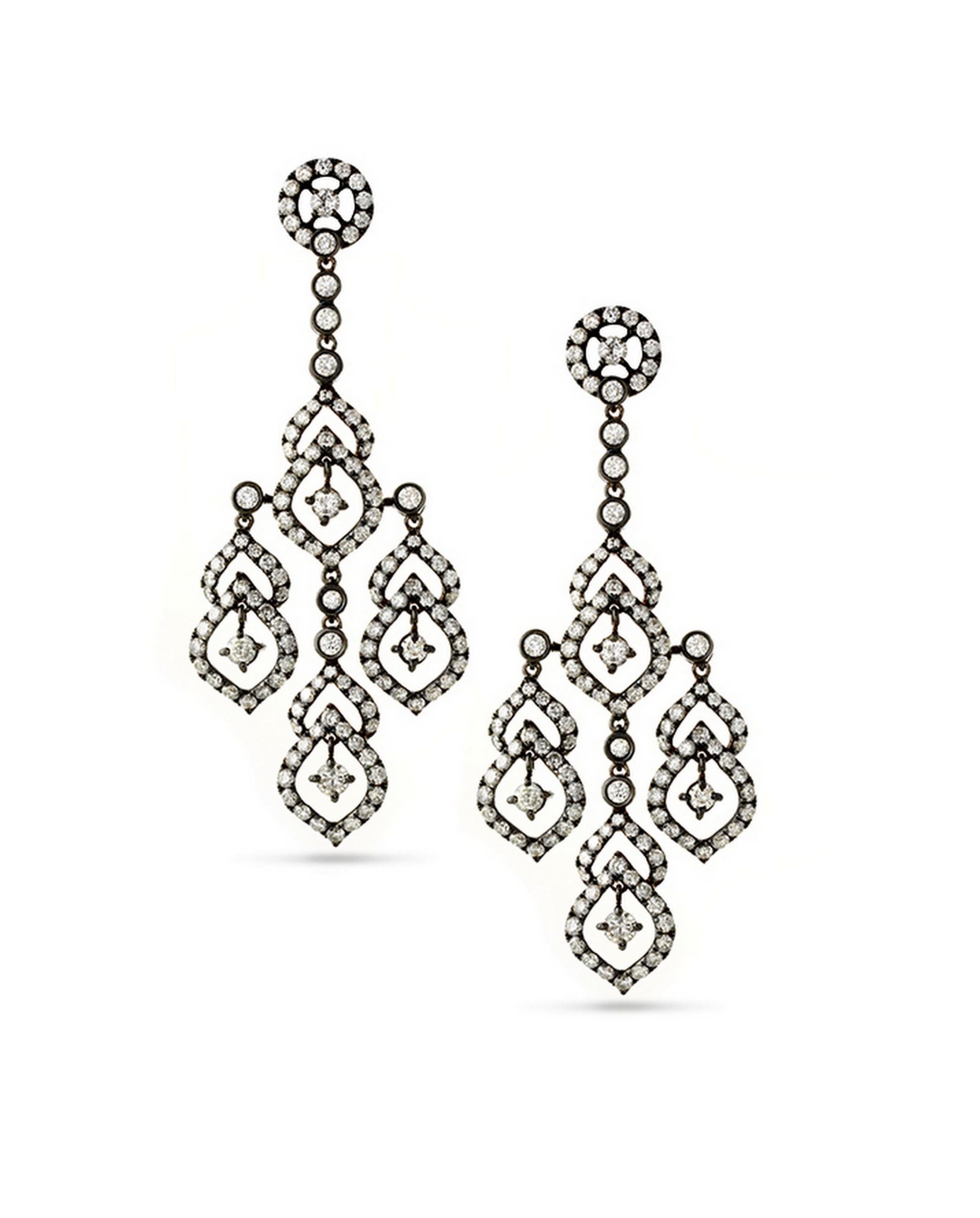 Whether your “go to” Elegance is Grace Kelly or Beyoncé - these Elegant Diamond Earrings will dance all night with you!!! Visions of a timeless classic with modern sensualities await your evenings…

6.52Cts Round Brilliant Diamonds
18Kt White gold