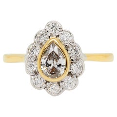 Bague de fiançailles en or blanc et jaune 18 carats avec couronne de diamants en forme de poire