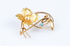 18 carat yellow and pink gold turquoise brooch